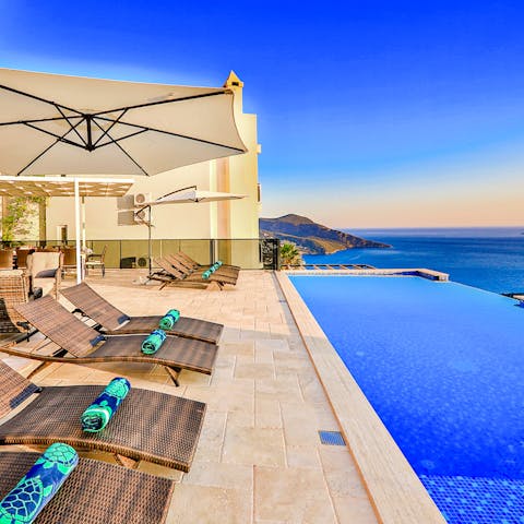 Swim out to the edge of the infinity pool and admire the beautiful ocean views