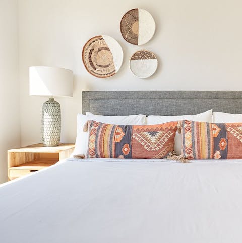 Snuggle up after a long day in the Southwestern-inspired bedroom