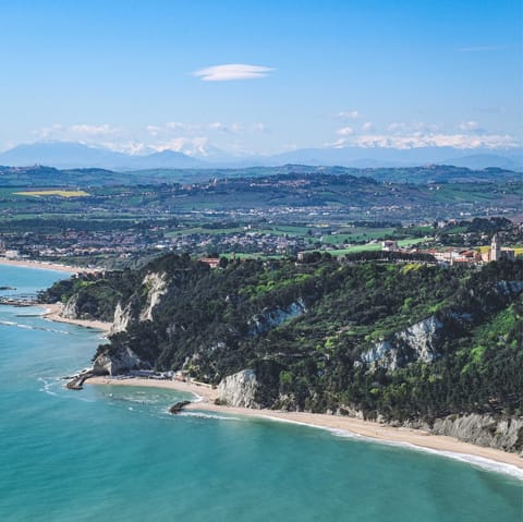 Explore the sandy coves, limestone cliffs and medieval villages of Marche