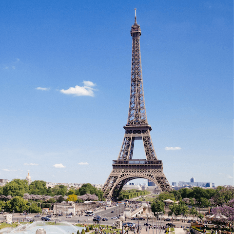 Pay a visit to the iconic Eiffel Tower, a scenic stroll from your doorstep