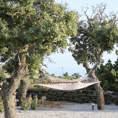 Take an afternoon nap in the shade of the trees as you get comfortable on the hammock