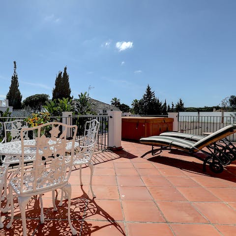 Sunbathe or sit up on the first floor terrace with a good book and a cold drink