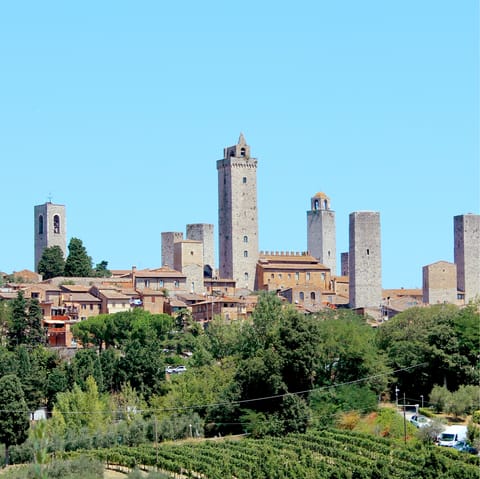 Spend a day sightseeing in San Gimignano – a short drive away 
