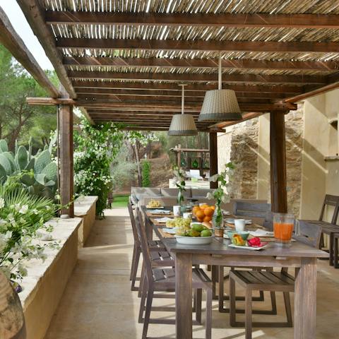 Come together for lazy lunches alfresco beneath the pergola