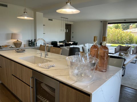 Prepare a meal over a glass of wine in the sociable kitchen