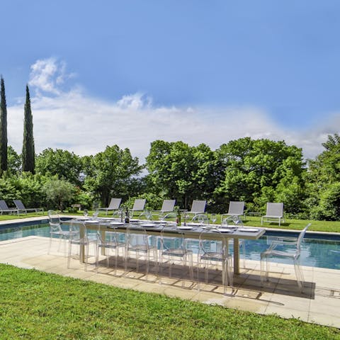 Dine poolside at the alfresco dining area 