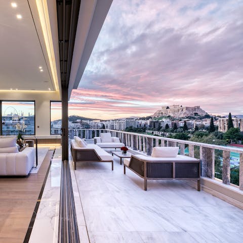 Sit out on the private balcony and take in stunning views of Athens