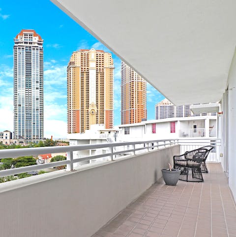 Look out over your Sunny Isles neighbourhood from the full-length balcony