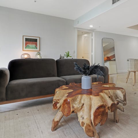 Sink into the velvet sofa in the welcoming open-plan living area