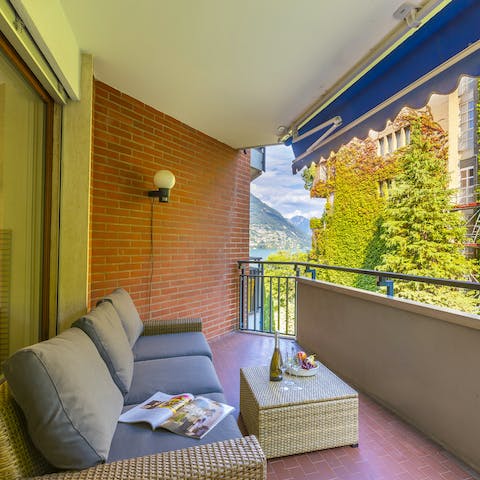Sip a sundowner on the private balcony while enjoying Lake Lugano views