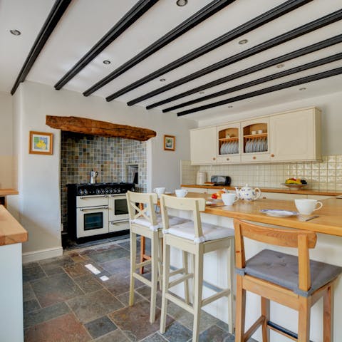 Spend leisurely mornings together around the kitchen island, enjoying a cooked breakfast and coffee
