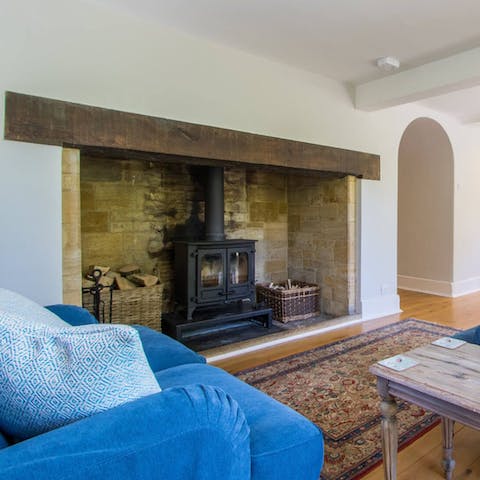 Throw another log on the wood-burning stove in the old hearth