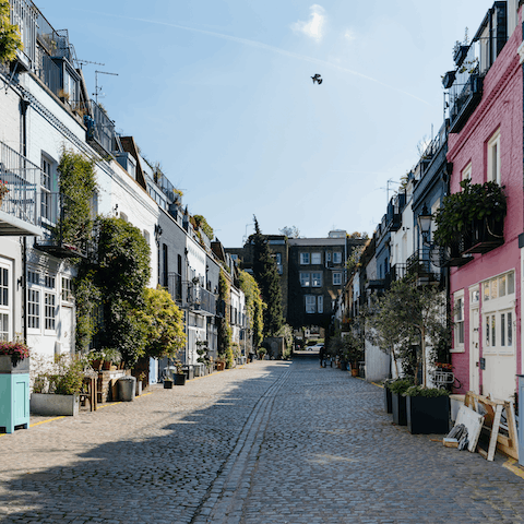 Explore the cobbled streets and colourful homes of Notting Hill, just five minutes away