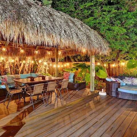 Sip cocktails in the tiki hut on balmy summer evenings