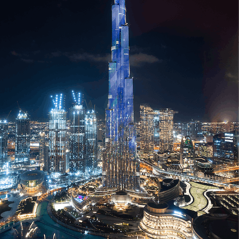 Capture the perfect night shot of the illuminated and iconic Burj Khalifa, a short drive away