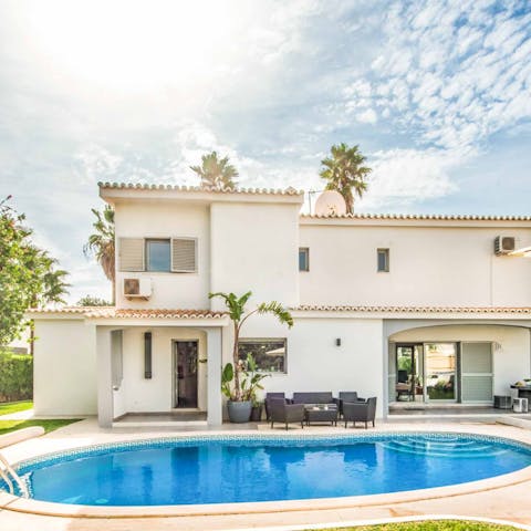 Float in the clear waters of the private pool