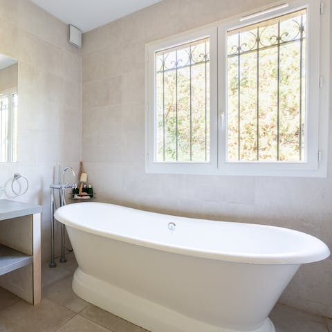 Add a touch of luxury to your day by enjoying a luxurious soak in the freestanding tub