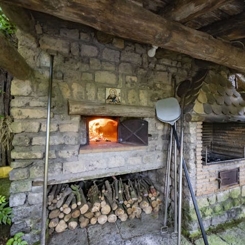 Get fired up by the traditional outdoor pizza oven