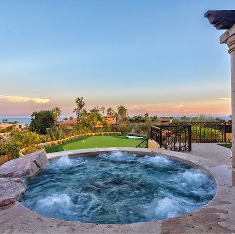 Watch the sunset from your private Jacuzzi