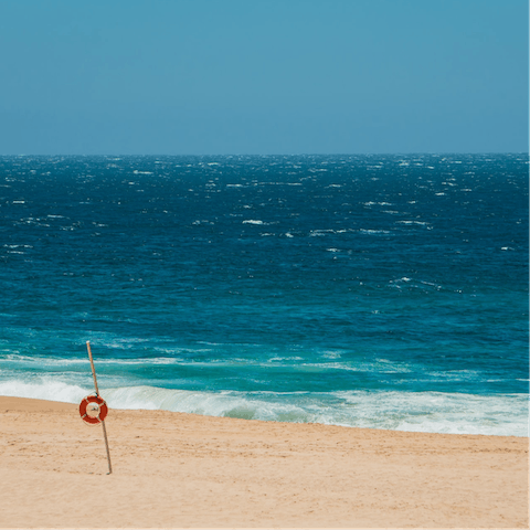 Spend endless days on the famous sands of Cabo