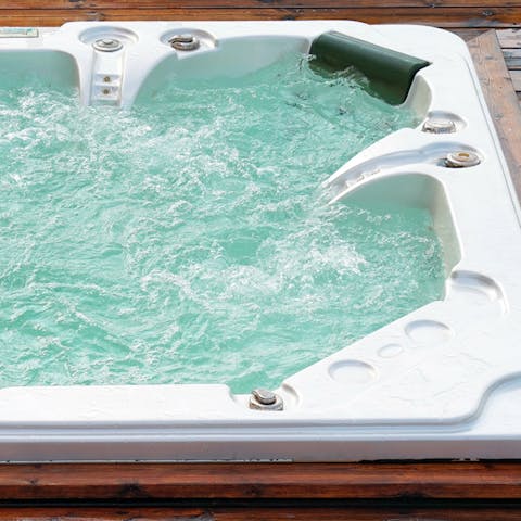 Treat yourself to a soak in the outdoor hot tub