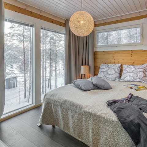 Wake up to panoramic views of the surrounding forest