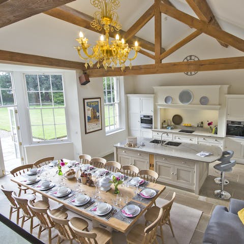 Gather around the fourteen-seater dining table and socialise with friends and family