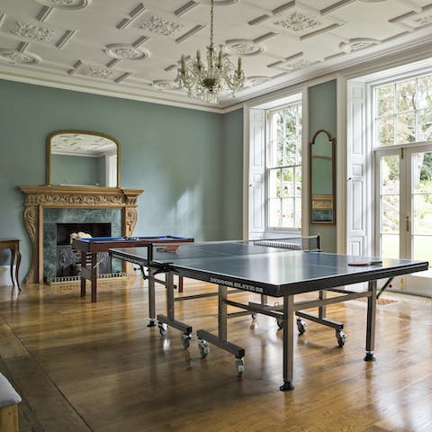 Challenge all comers to games of table tennis and pool in the vast games room