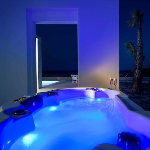 Enjoy a nighttime soak in the hot tub