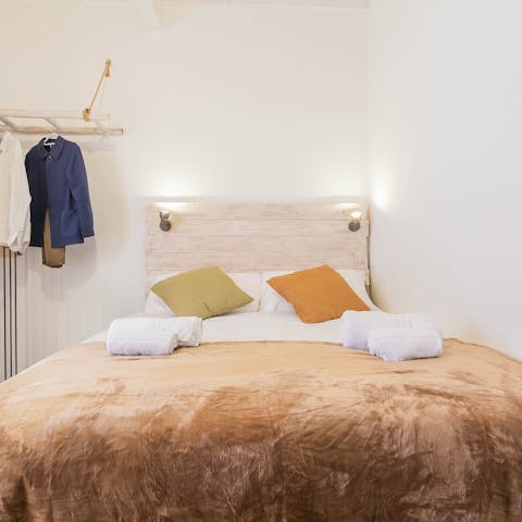 Wake up in the comfortable bedroom and perch by its Juliet balcony for a scenic start to the day