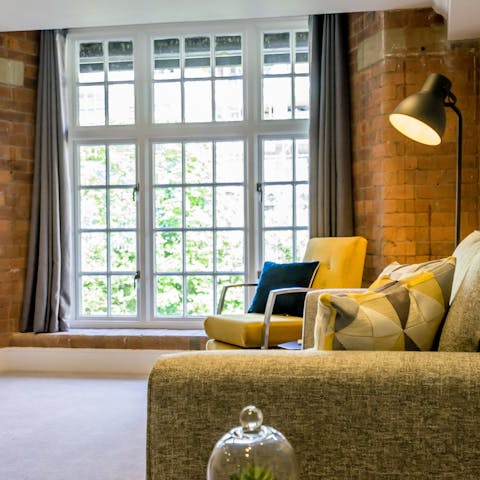 Admire original features of the architecture, like the sash windows and exposed brickwork