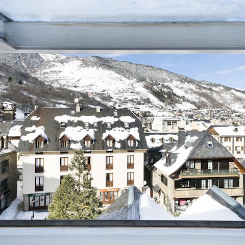 Admire the striking views of the old town and mountains from your windows