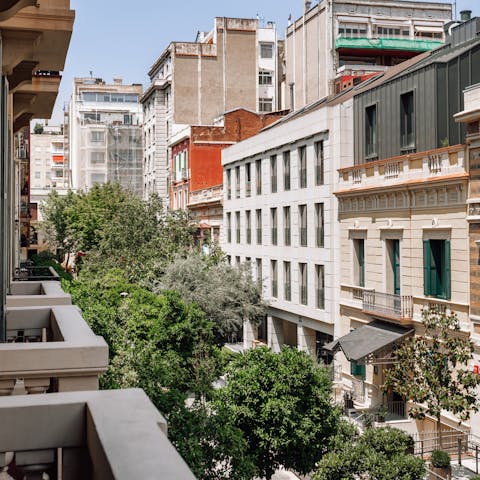 Sip Sangria and watch the world go by from the French balcony