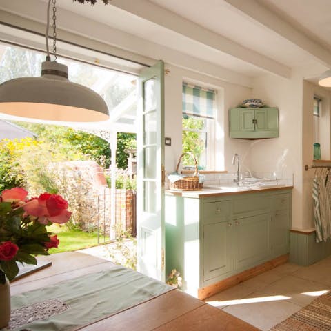 Open the kitchen right up to the rear terrace