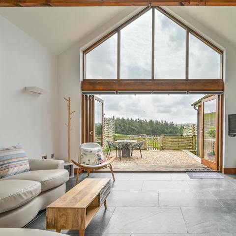 Open up the bifold doors and let the outside in