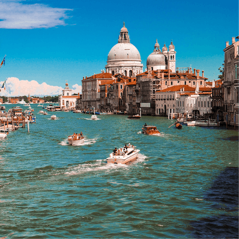 Stroll to the Grand Canal to hop on a vaporetto – it's the best way to see Venice