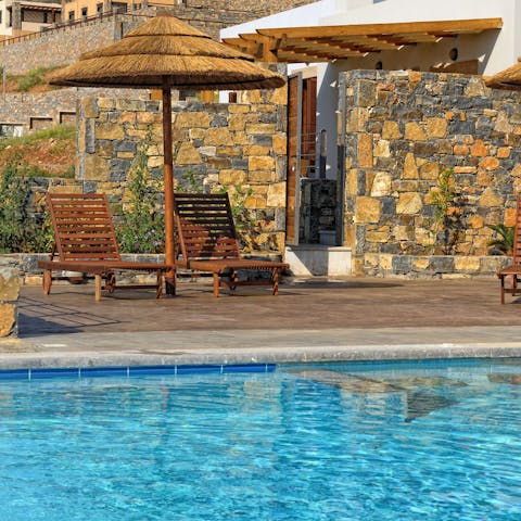 Unwind in style beside your private pool