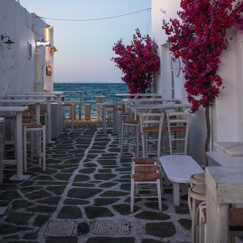 Wander around the charming tavernas of Paros