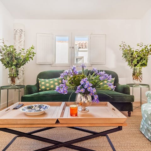 Kick back in the bright, beautiful living room with a glass of Spanish wine