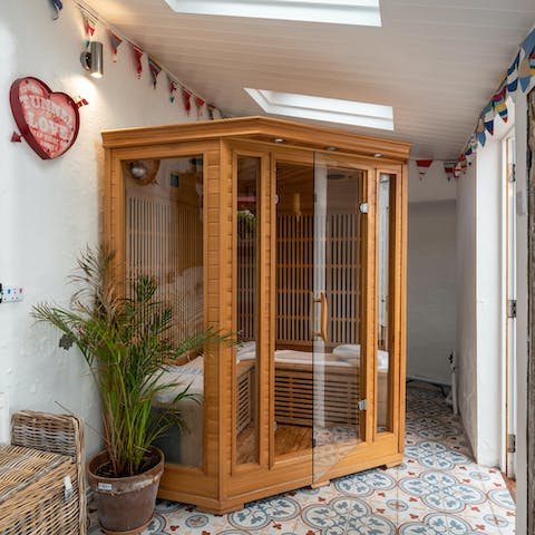 Unwind with a candlelit session in the private sauna