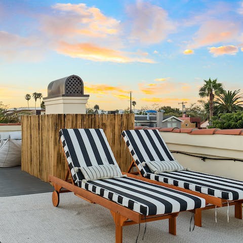 Kick your feet up on the rooftop, with great seats for sunset-watching