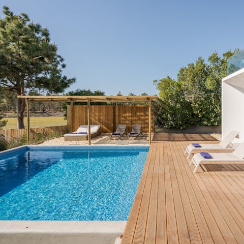 Experience total relaxation whilst lounging by the pool 