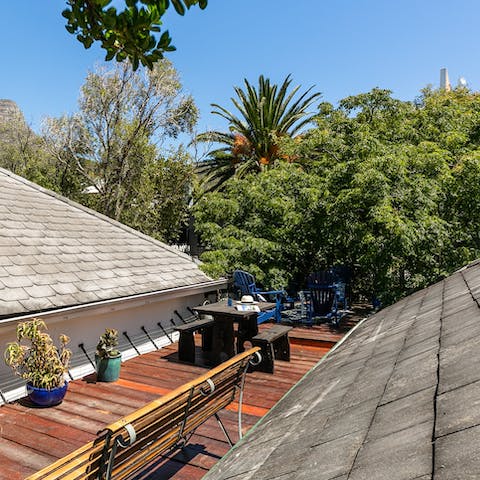 Fire up the barbecue for supper on the rooftop terrace