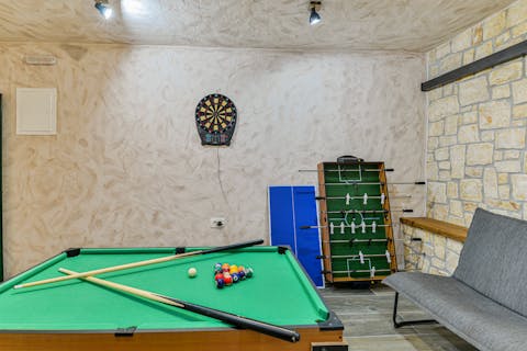 Play a spot of pool or table football in the private games room