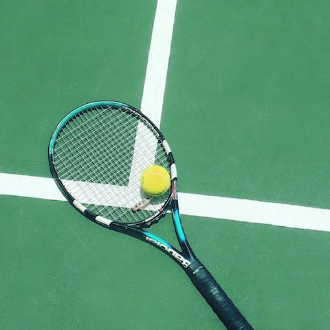 Play a game of tennis on the communal courts