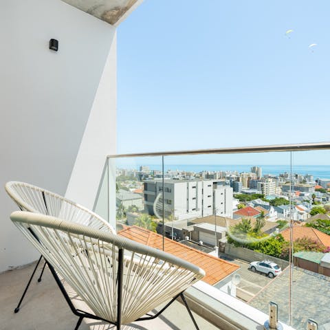 Share a glass of Chardonnay on your private balcony