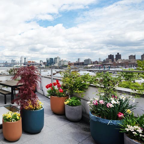 Admire stunning views across the Hudson River from the private roof terrace