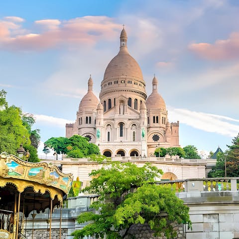 Admire the impressive sight of the Sacré Coeur – a short stroll away