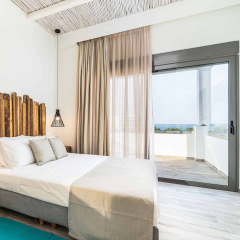 Wake up to sea views on the private balcony