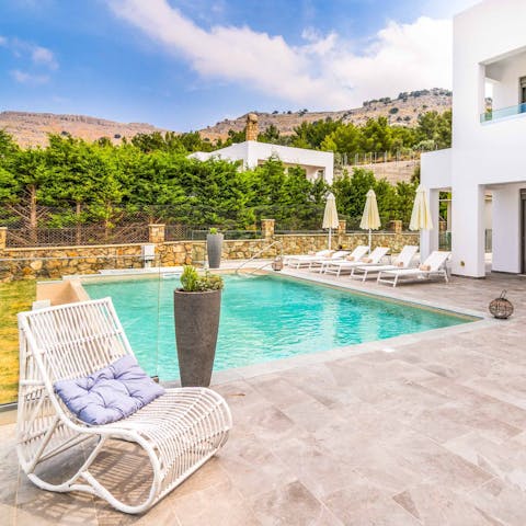Relax in the Rhodes sun by the private pool